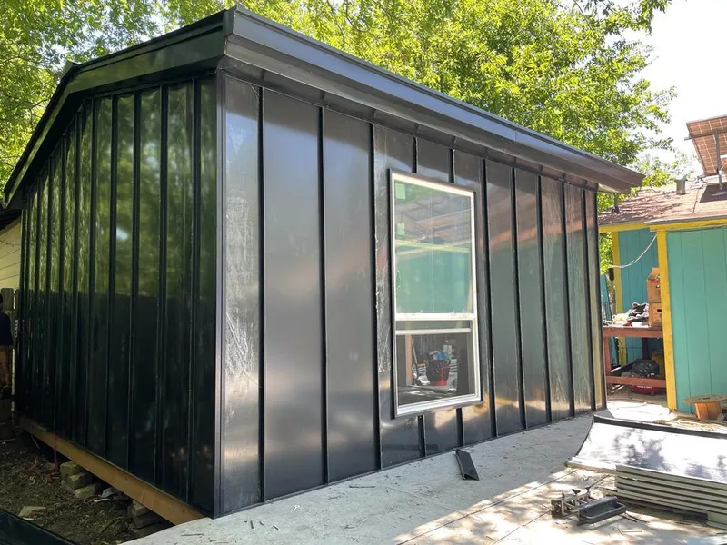 Black standing seam metal wall panels for Roof Inspection in Central