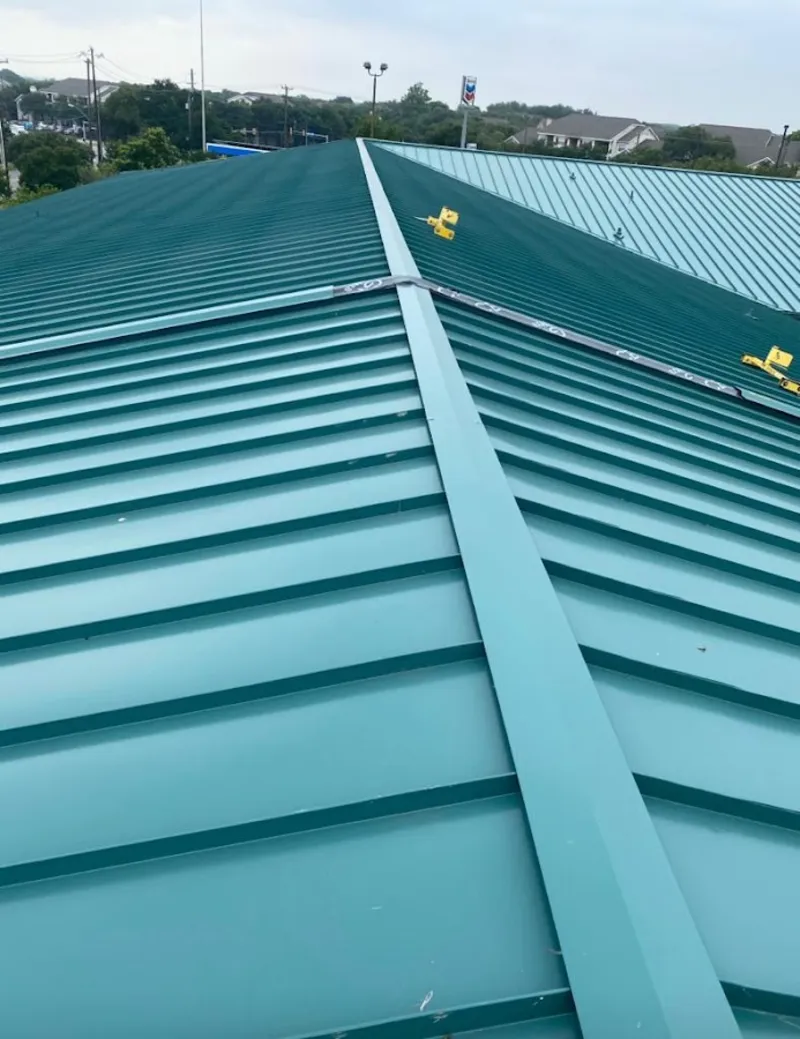 Green commercial metal roof ridge and valley for Metal Roof Repair in Central
